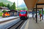 Ge 4/4 III 645  Tujetsch  mit dem RE 1156 nach Chur in Bergün. Daneben steht Tm 86. (6. August 2015)
Erst hinterher bemerkte ich die Ähnlichkeit zu diesem Bild: http://www.bahnbilder.de/bild/schweiz~rhaetische-bahn~dienst--und-rangierloks/872476/tm-86-und-ge-44-iii.html