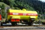 RhB - Xk 9049 II am 29.08.1998 in Ilanz - Wasserwagen - 2-achsig mit 1 offenen Plattform - Baujahr 1926 - RhB - Gewicht 8,70t - Ladegewicht 15,00t - LP 7,91 m - zulssige Geschwindigkeit Aufkleber 60