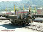 Der X 9397(ex.N 8019,Langholzwagen von 1906)als Adapter zwischen Schmalspur- und Normalspurfahrzeugen im Bahnhof Untervaz.