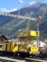 RhB - Xk 9019 II am 04.09.1996 in Zernez - Hebebhnenwagen hydraulisch - 2-achsig mit 1 offenen Plattform - Baujahr 1903 - MAN - Gewicht 8,68t - Ladegewicht 3,00t - LP 7,50m - zulssige