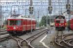 Be 4/4 513 verl�sst Chur Richtung Thusis w�hrend nebenan die Ge 4/4 I 608  Madrisa  mit geschemelten Normalspurwagen auf die Weiterfahrt nach Landquart wartet.