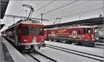 S1 1523 mit Be 4/4 511 und RE1740 mit Ge 4/4 II 617  Ilanz  in Landquart. (15.02.2018)