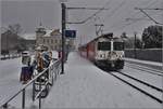 RE1342 mit Ge 4/4 II 633  Zuoz  in Malans. (15.02.2018)