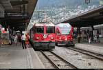 Ge 4/4 II 632  Zizers  der Rhätischen Bahn (RhB) als RE 1252 von Scuol-Tarasp (CH) nach Disentis/Mustér (CH) trifft auf ABe 8/12 3513  Simeon Bavier  (Stadler ALLEGRA) als IR 1161 von Chur