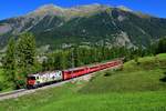 Ge 4/4 II 611 mit einem Regio am 04.09.2019 bei Zernez.