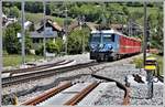 RE1036 nach Disentis/Mustér mit Ge 4/4 II 619  Samedan  und Steuerwagen BDt 1751 auf dem im Bau befindlichen Doppelspurabschnitt zwischen Malans und Landquart. (04.05.2020)
