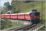 RE1249 mit Ge 4/4 II 613  Domat/Ems  bei Saas. (24.09.2009)