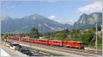 RE1248 mit Ge 4/4 II 618  Bergn/Bravuogn  bedient den Bahnhof Zizers auf dem Weg nach Chur. Im Hintergrund der Vilan, die Schesaplana und die Klus (Eingang zum Prttigau) (28.06.2010)