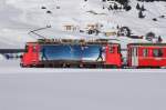 Portrait der Ge 4/4 II 617 am 27.12.11 bei Davos Dorf.