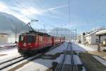 Aussicht aus dem Nostalgiezug auf den vorbeifahrenden  Engadiner-Pendel  853 von S-chanf nach Celerina mit Ge 4/4 II 618  Bergn/Bravuogn im Bahnhof Bever. (23.01.2011)