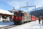 RE 1232 Scuol-Tarasp/Disentis mit Ge 4/4 II 619  Samedan  in Ardez.