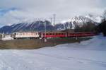 Ge 4/4 II 622 fhrt am 11.3.12 mit einem Extarzug nach S-chanf von St. Moritz Richtung Celerina.