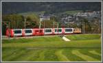 GlacierExpress 910 mit Ge 4/4 II 622  Arosa  zwischen Felsberg und Chur. (02.05.2012)