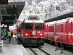 RhB - Ge 4/4  614 vor Schnellzug nach Disentis im Bahnhof Chur am 20.01.2013