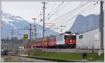 RE1240 mit Ge 4/4 II 616  Filisur  fhrt in Untervaz-Trimmis ein.
