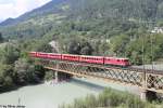 Ge 4/4'' 614 ''Schiers'' am 10.8.2013 auf der Rheinbrcke kurz vor Reichenau-Tamins als RE 1249 nach Scuol-Tarasp.