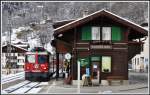 RE1237 mit Ge 4/4 II 616  Filisur  in Klosters Dorf. (28.11.2013)