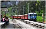 RE1257 mit Ge 4/4 II 619  Samedan  in Versam-Safien. (05.05.2015)