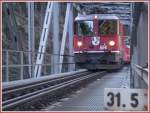 Ge 4/4 II 614  Schiers  fhrt bei Kilometer 31.5 auf die Vorderheinbrcke.
