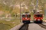 RhB/FO: Seltenes oder sagar einziges Zusammentreffen von RhB Ge 4/4 II 629 und FO Deh 4/4 II 91-96 auf 2'044 m ü M. am Oberalpsee im September 1986. Es handelte sich um eine Überfuhr der RhB Ge 4/4 II 629 von Brig nach Disentis. Auf der Oberalppasshöhe musste für die Weiterfahrt der Deh 4/4 II umgestellt werden. 
Foto: Walter Ruetsch