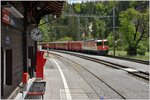 RE1241 mit Ge 4/4 II 622  Arosa  in Trin.