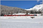 R1929 nach Pontresina mit Ge 4/4 II 615  Klosters  zwischen Bever und Samedan.