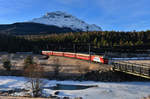 Ge 4/4 II 618 mit einem R nach Scuol-Tarasp am 26.12.2016 bei Punt Muragl.