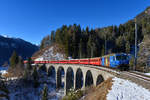 Ge 4/4 III 652 mit einem Regio am 06.12.2017 bei Filisur.