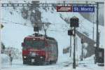 Ge 4/4 III 646  Sta.Maria/Val Mstair  sucht ihren Weg durch das Schneegesber in St.Moritz.