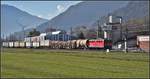 Güterzug 5732 aus Ilanz mit der Ge 6/6 II 701  Rätia  mit Holz und Wasser fährt in Untervaz-Trimmis ein.