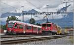 S1 1512 mit ABe 4/16 3102 nach Schiers  kreuzt in Untervaz-Trimmis 5737 mit Ge 6/6 II 705.