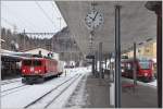 Ge 6/6 II 704  Davos  wird bald mit einem Kurzgüterzug nach Samedan fahren und ABe 8/12 3502 wird in Kürze nach Poschiavo abfahren. (14.01.2016)