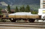 RhB - Kk-w 7315 am 10.05.1992 in Thusis - Niederbordwagen 2-achsig mit 1 offenen Plattform - Baujahr 1911 - Louv - Gewicht 5,30t - Zuladung 12,50t - LP 7,49m - zulssige Geschwindigkeit Aufkleber 60/B km/h - 2=14.07.1989 - Lebenslauf: ex M1 7315 - 1969 Kk 7315 - 1974 Kk-w 7315 - 1986 Kkp 7315 Kipfen - 1989 Kk-w 7315 - Hinweis: mit Kennzeichnung B fr Zugreihe im Anschriftenfeld! 

