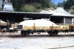 RhB - Kk-w 7324 am 25.05.1991 in Reichenau - Niederbordwagen 2-achsig mit 1 offenen Plattform - Baujahr 1911 - Louv - Gewicht 5,44t - Zuladung 12,50t - LP 7,79m - zulssige Geschwindigkeit Aufkleber