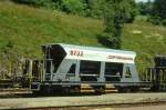 RhB - Fad 8732 am 28.06.1995 in Filisur - Selbstentlade-Schotterwagen 4-achsig mit 1 offenen Plattform - bernahme 08.07.1993 - JMR - Gewicht 15,17t - Zuladung 33,00t - LP 12,50m - zulssige