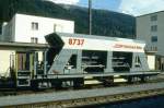 RhB - Fad 8737 am 10.05.1994 in Davos Platz - Selbstentlade-Schotterwagen 4-achsig mit 1 offenen Plattform - bernahme 29.09.1993 - JMR - Gewicht 15,49t - Zuladung 33,00t - LP 12,50m - zulssige Geschwindigkeit 80/B km/h - Logo RhB in deutsch auf weien Untergrund - Lebenslauf: ex Fad 8737 - 02/2004 Fac 8737.
