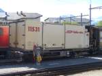 RhB - Abgestellter Gterwagen Lb 7859 mit RhB Container 11531 im Bahnhof von Samedan am 25.08.2007