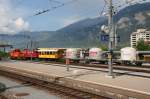 Gterzug mit Personenwagenberfhrung aus Samedan (mit wahrscheinlichem Ziel Landquart) bestehend aus Ge 6/6 II 705  Pontresina/Puntraschigna  + BC 110 + Uc 8069 + Uc 8081 + Uc 8091 + Uc 8032 + Uc