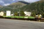 RhB - Skl 8405 am 31.08.2007 in Samedan - Autotransportwagen 4-achsig mit 1 offenen Plattform ohne Sy Bremsschuh - Baujahr 1911 bernahme 12.02.1982 - RhB - Gewicht 11,96t - Zuladung 10,00t - LP 16,44m - zulssige Geschwindigkeit 80 km/h - 2=28.09.1999 - Lebenslauf: Ug ex ABC4 607 - 1931 ABC4 607 - 1951 BC4 607 - 1956 AB4 1607 - 1964 AB 1607 - 1977 ausr. - 12.02.1982 Skl 8405
