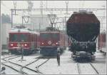 Be 4/4 514, Ge 4/4 I 605  Silvretta  und geschemelte Getreidewagen in Landquart. (11.03.2010)