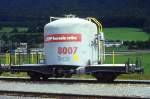RhB - Uce 8007 am 02.09.1996 in Untervaz - Zementsilowagen 2-achsig mit 1 offenen Plattform - Baujahr 1964 - JMR/MBA - Gewicht 8,30t - Zuladung 15,00t - LP 7,75m - zulssige Geschwindigkeit 65 km/h - 2=19.02.1990 - Logo RhB in italienisch - Lebenslauf: ex OB1 8007 - 1969 Uce 8007 - 2004 Uc 2007.  Hinweis: gescanntes Dia
