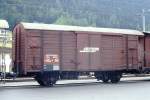 RhB - Gbk 5625 am 03.10.1990 in Davos Platz - Gedeckter Gterwagen 2-achsig mit 1 offenen Plattform - Reserviert fr PAPIERTRANSPORTE Davos-Pl - Landquart - Baujahr 1931 - SIG - Gewicht 7,38t -