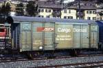 RhB - Gbk-v 5507 am 09.03.1989 in Samedan - Gedeckter Gterwagen 2-achsig mit 1 offenen Plattform CARGO DOMIZIL - Baujahr 1911 - LOUV/RhB - Gewicht 7,00t - Zuladung 12,50t - LP 8,49m - zulssige