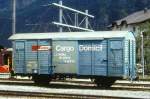 RhB - Gbk-v 5508 am 22.08.1995 in Samedan - Gedeckter Gterwagen 2-achsig mit 1 offenen Plattform CARGO DOMICIL - Baujahr 1911 - LOUV/RhB - Gewicht 6,86t - Zuladung 12,50t - LP 8,49m - zulssige Geschwindigkeit Aufkleber 70 km/h - 2=19.03.1987 - Beschriftung: rhtoromanisch - Lebenslauf: ex K1 5508 - 1969 Gbk 5508 - 1970a - 1977 Gbk-v 5508 - 08/2005 Abbruch - Hinweis: gescanntes Dia
