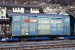 RhB - Gbk-v 5521 am 31.03.1996 in Samedan - Gedeckter Gterwagen 2-achsig mit 1 offenen Plattform CARGO DOMIZIL - Baujahr 1911 - LOUV/RhB - Gewicht 6,88t - Zuladung 12,50t - LP 8,49m - zulssige