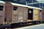 RhB - Gb 5815 am 04.09.1996 in Samedan - Gedeckter Gterwagen 2-achsig mit 1 offenen Plattform - Baujahr 1967 - SIG - Gewicht 7,27t - Zuladung 15,00t - LP 8,50m - zulssige Geschwindigkeit Aufkleber 70 km/h - 2=21.05.1985 - Lebenslauf: ex K 5815 - 1969 Gb 5815 - 10/1996a - 05/1997 Xk 9351.
