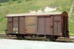 RhB - Gbk-v 5536 am 28.05.1990 in Scuol - Gedeckter Gterwagen 2-achsig mit 1 offenen Plattform - Baujahr 1913 - Reich - Gewicht 6,90t - Zuladung 12,50t - LP 8,49m - zulssige Geschwindigkeit 75 km/h - 2=27.04.1987 - Lebenslauf: ex K1 5536 - 1969 Gbk-v  5536 - 1970a - 1973 Gbk-v 5536.
