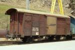 RhB - Gbk-v 5568 am 09.05.1991 in St.Moritz - Gedeckter Gterwagen 2-achsig mit 1 offenen Plattform - Baujahr 1913 - Reich - Gewicht 7,64t - Zuladung 12,50t - LP 8,49m - zulssige Geschwindigkeit 75