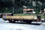 RhB - Kk-w 7307 am 01.09.1993 in Surava - Niederbordwagen 2-achsig mit 1 offenen Plattform - Baujahr 1911 - Louv - Gewicht 5,50t - Zuladung 12,50t - LP 7,49m - zulssige Geschwindigkeit Aufkleber
