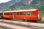 RhB - B 2323 am 24.05.1990 in Disentis - 2.Klasse Personenwagen - Mitteleinstiegswagen mittelschwerer Stahlbauart - Baujahr 1947 - SWS - Fahrzeuggewicht 21,00t - Sitzpltze 64 - LP 17,63m - zulssige